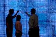 Dr. Edward Nelson with students at UC Irvine's hyperwall